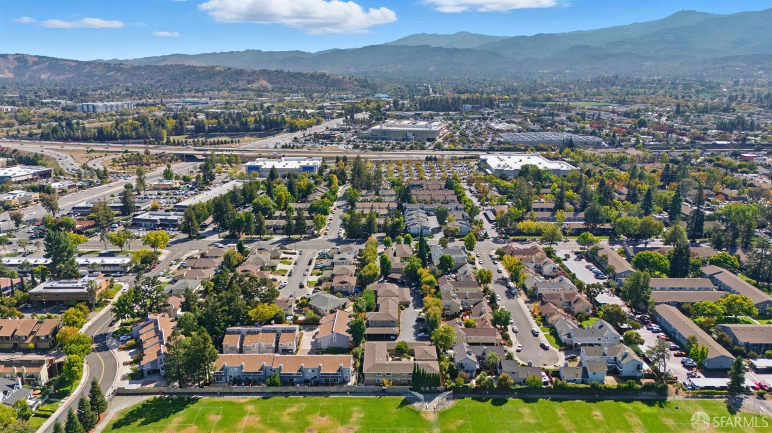 4970 Cherry Avenue, Unit 211 San Jose, CA 95118 - Photo 62 of 67 an aerial view of residential houses with outdoor space and river view