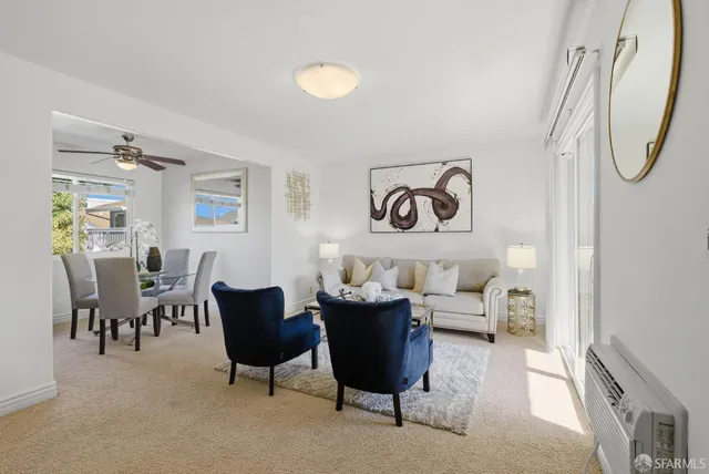 a kitchen with granite countertop a sink and a window
