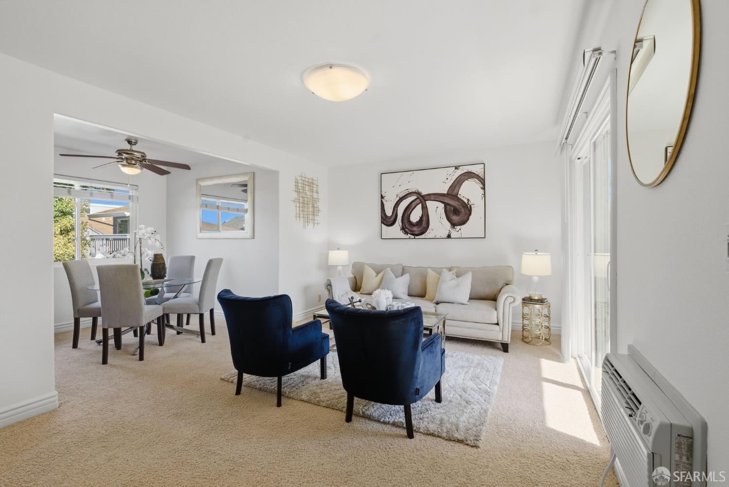 4970 Cherry Avenue, Unit 211 San Jose, CA 95118 - Photo 7 of 67 a living room with furniture and a table