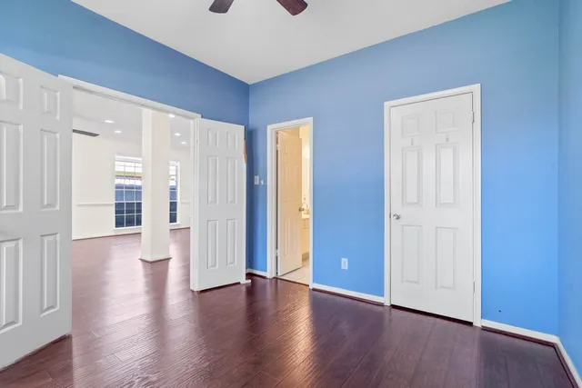 a view of an entryway with wooden floor