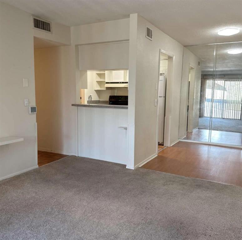4845 Cedar Springs Road, Unit 267 Dallas, TX 75219 - Photo 3 of 17 a view of a kitchen with a sink