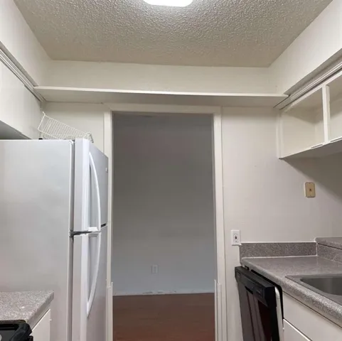 a bathroom with a glass door shower