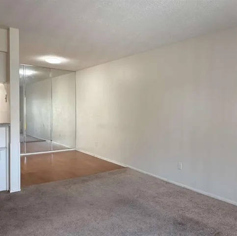 an empty room with a bench