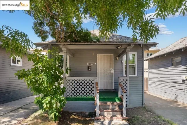 front view of a house with a garden
