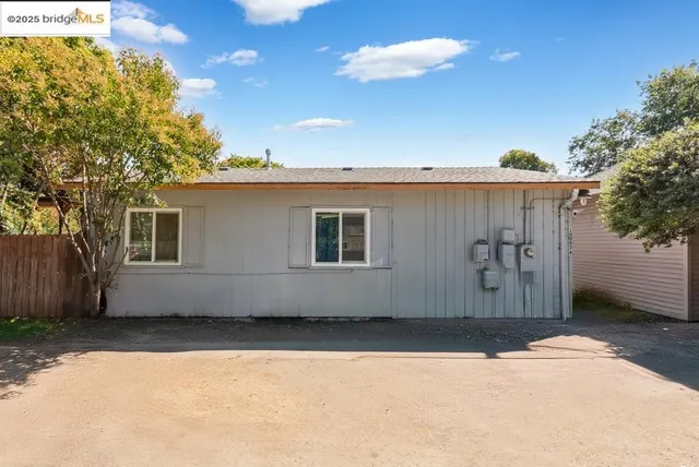 a house view with a outdoor space
