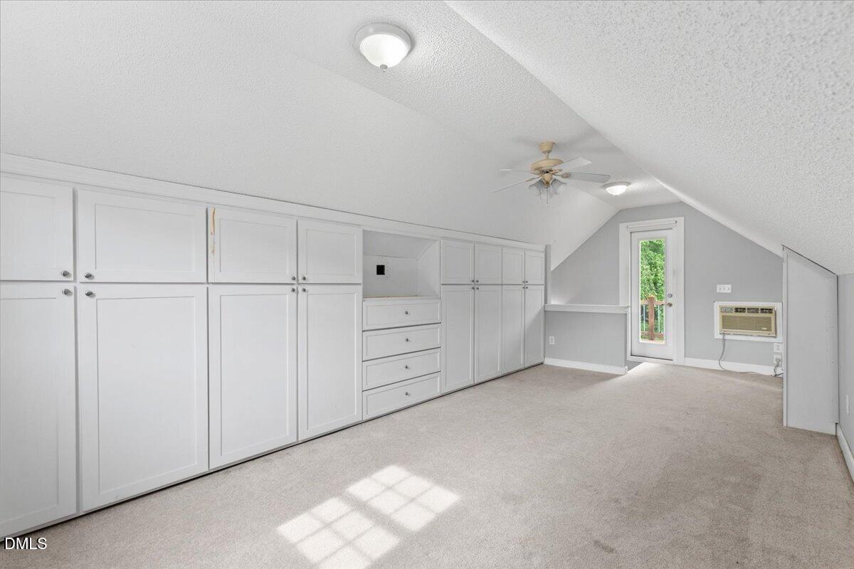 4317 South Mountain Drive Raleigh, NC 27603 - Photo 41 of 57 an empty room with windows
