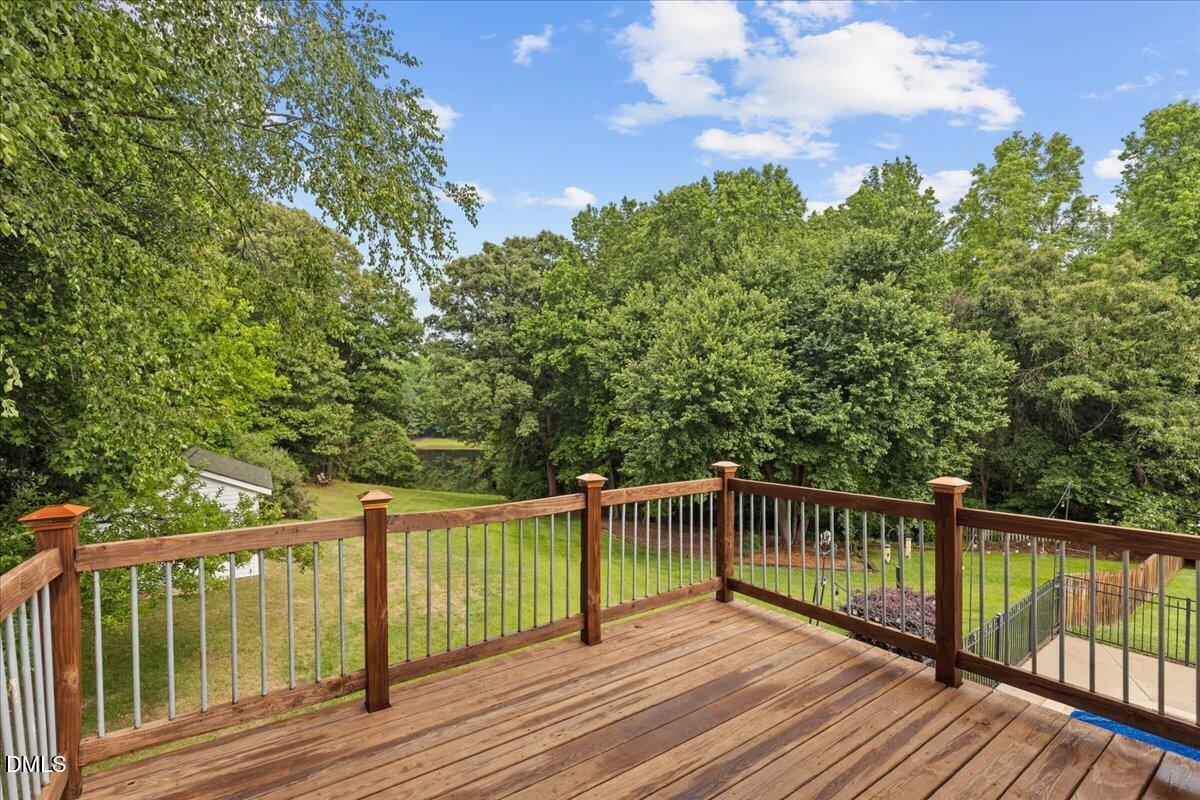 4317 South Mountain Drive Raleigh, NC 27603 - Photo 42 of 57 a view of a wooden deck