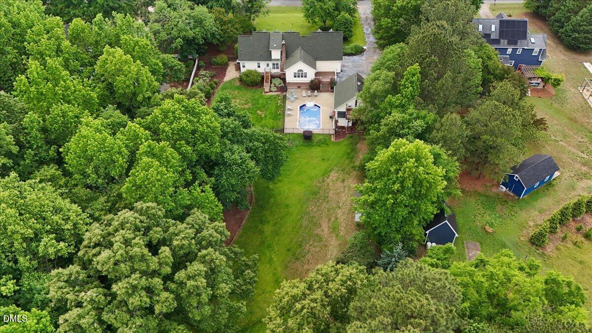 4317 South Mountain Drive Raleigh, NC 27603 - Photo 53 of 57 an aerial view of residential house with outdoor space and trees all around