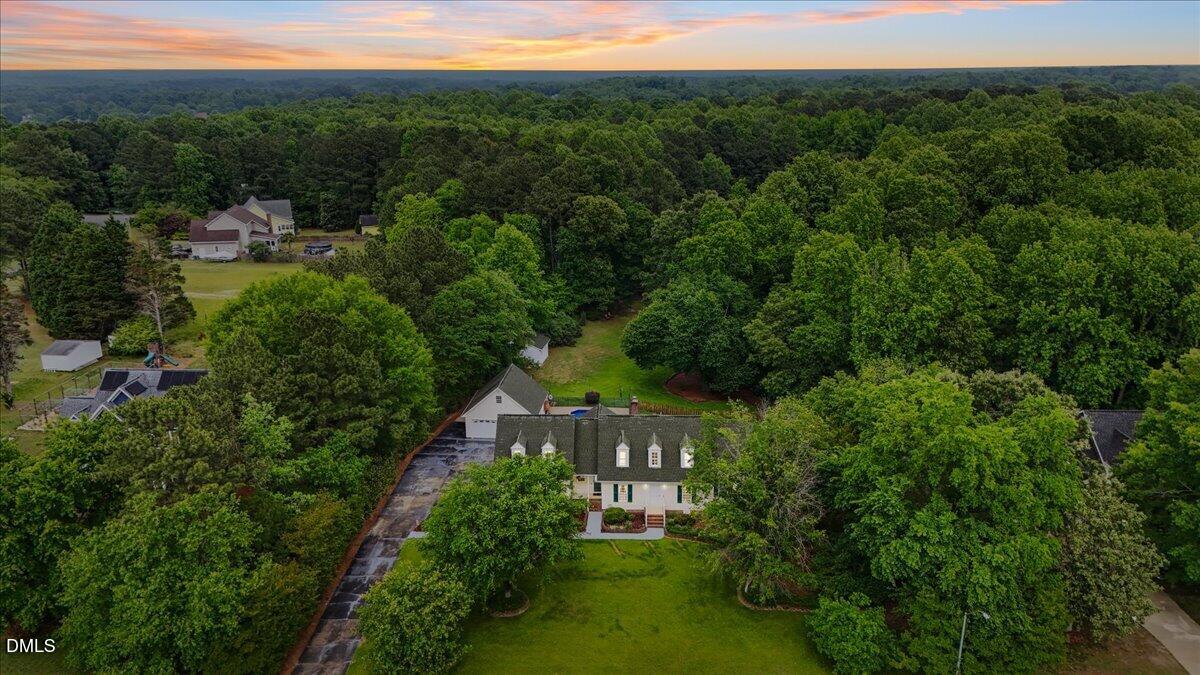 4317 South Mountain Drive Raleigh, NC 27603 - Photo 56 of 57 a view of a house with a yard