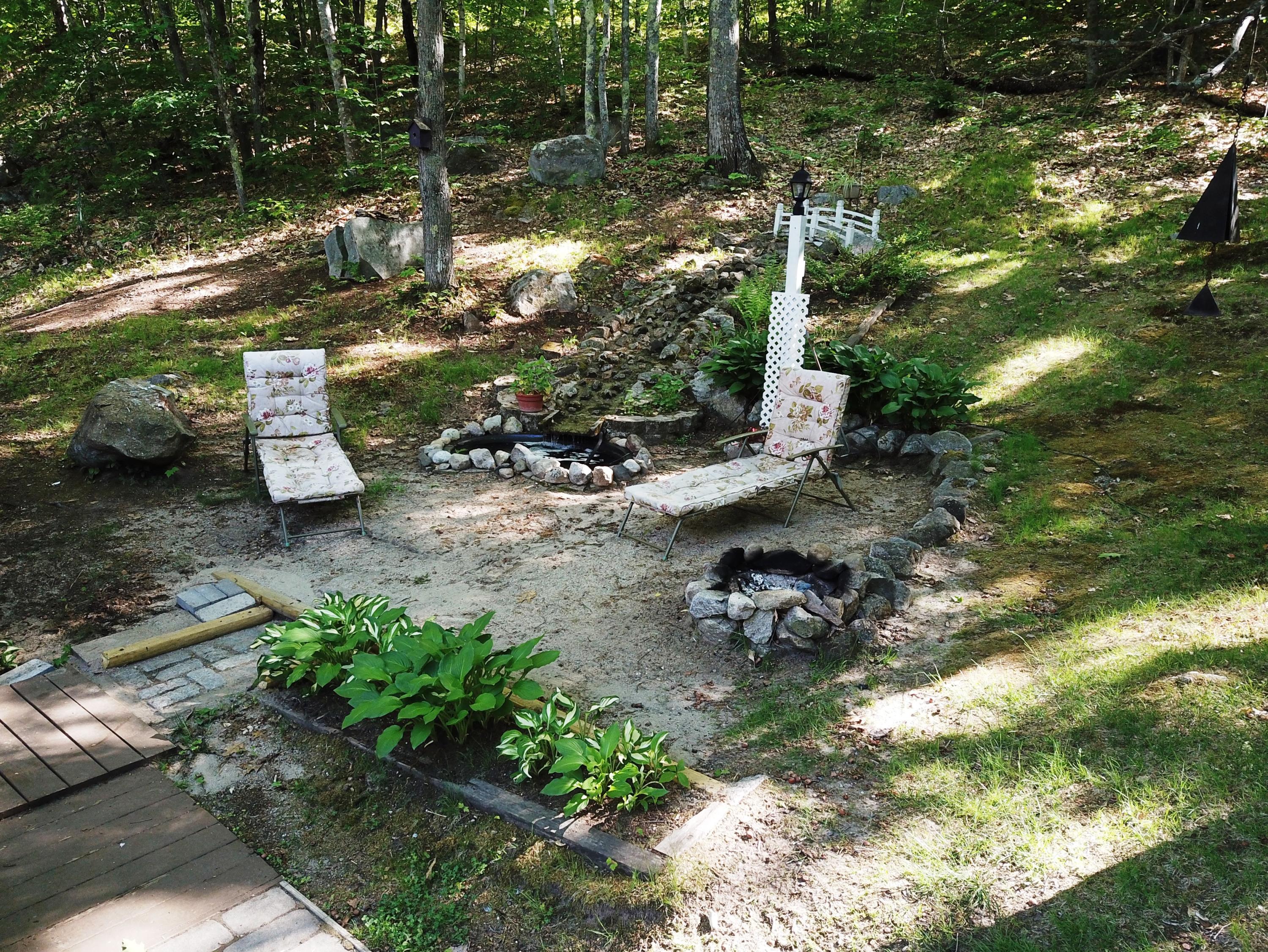 76 Newfield Road Shapleigh, ME 04076 - Photo 11 of 28 Sandy seating area!