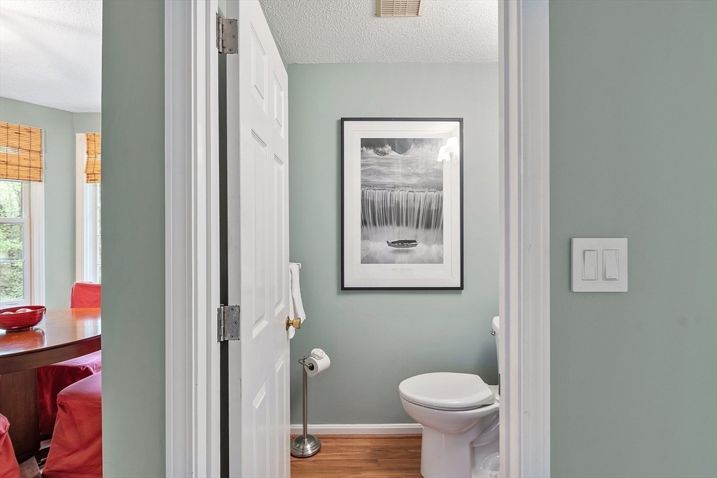 187 Turnpike Road, Unit 187 Chelmsford, MA 01824 - Photo 30 of 42 a bathroom with a toilet sink and a window