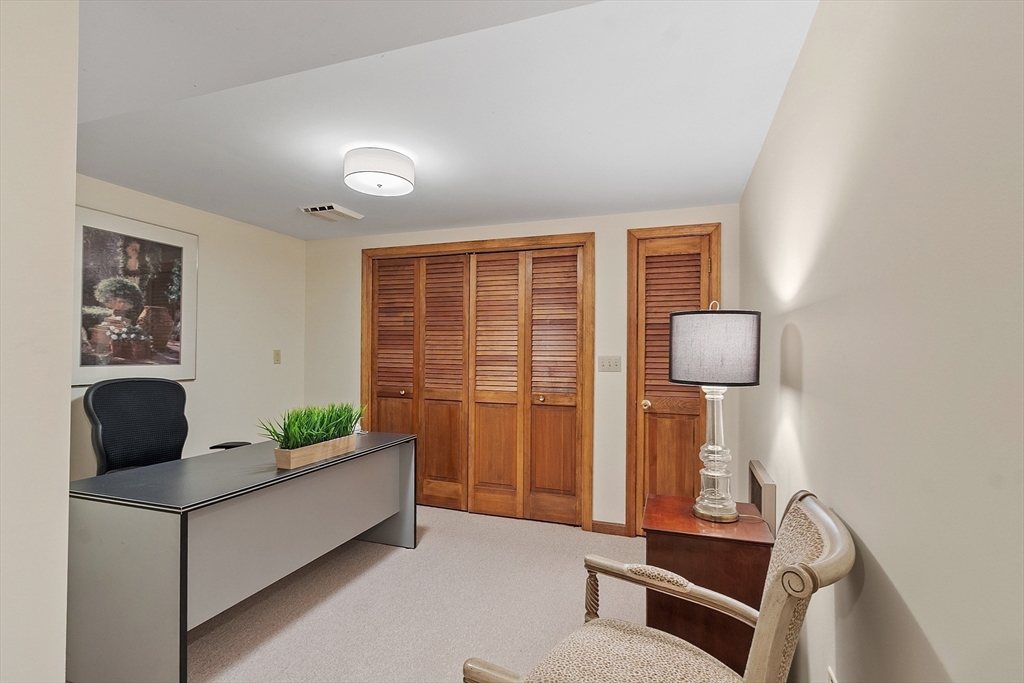 187 Turnpike Road, Unit 187 Chelmsford, MA 01824 - Photo 33 of 42 a living room with furniture