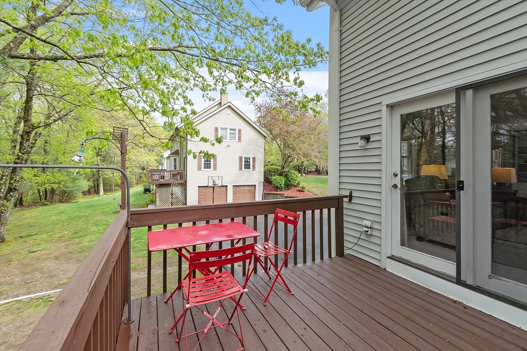 187 Turnpike Road, Unit 187 Chelmsford, MA 01824 - Photo 36 of 42 a view of a chairs on the roof deck
