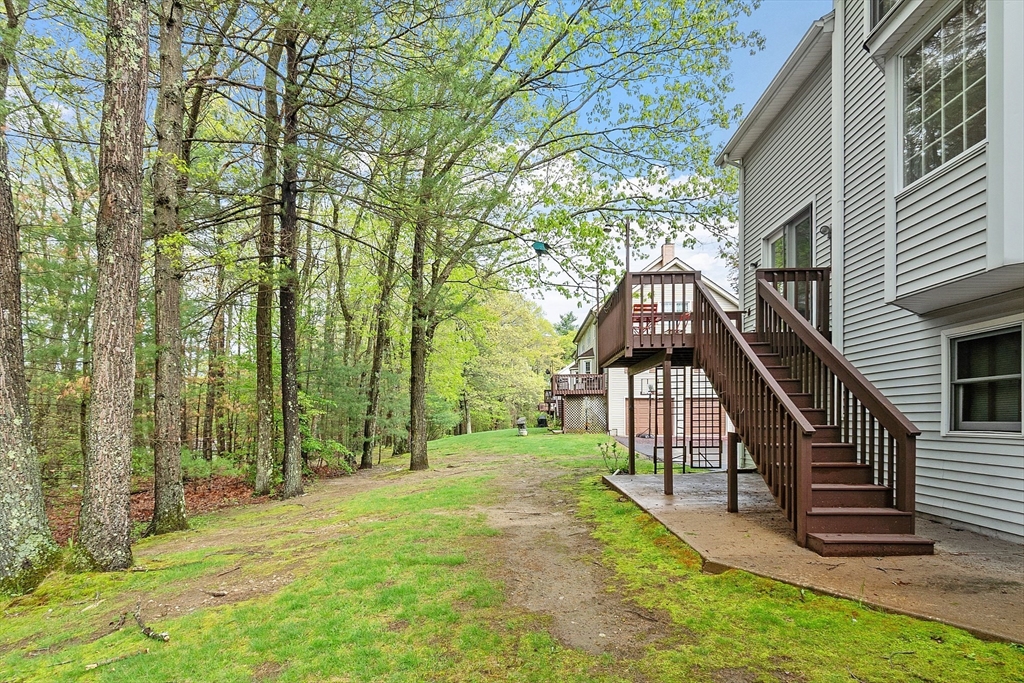 187 Turnpike Road, Unit 187 Chelmsford, MA 01824 - Photo 37 of 42 a view of outdoor space deck and yard