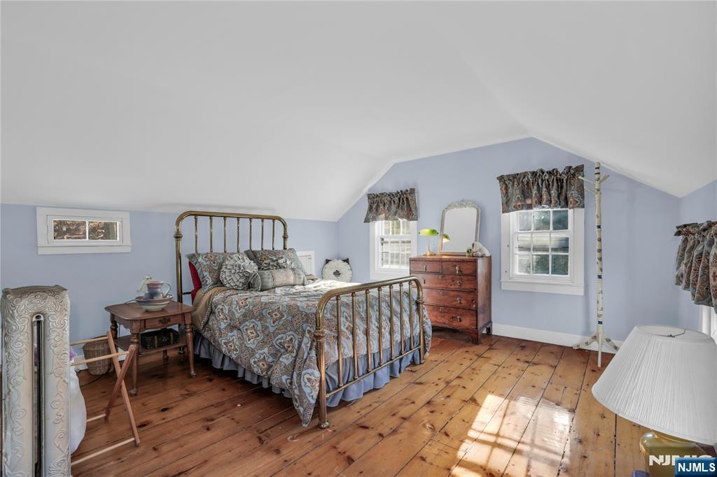 265 Little Falls Road Cedar Grove, NJ 07009 - Photo 26 of 49 a bedroom with furniture and a window