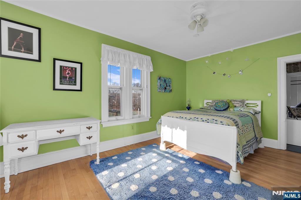 265 Little Falls Road Cedar Grove, NJ 07009 - Photo 32 of 49 a bedroom with a bed and a window