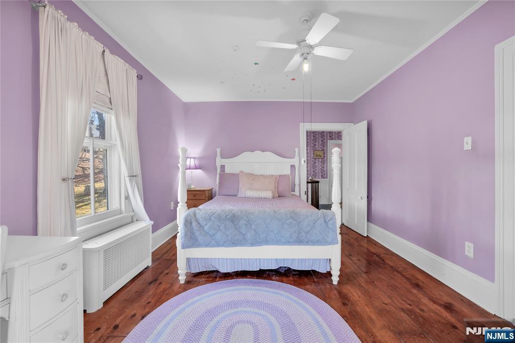 265 Little Falls Road Cedar Grove, NJ 07009 - Photo 35 of 49 a bedroom with a bed and window