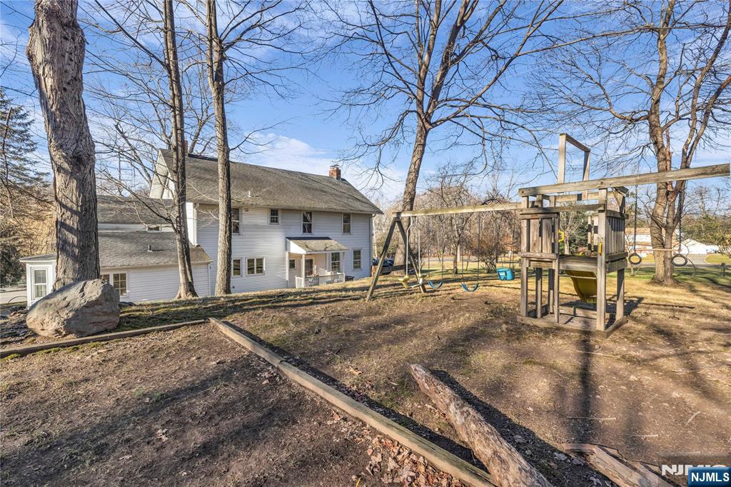 265 Little Falls Road Cedar Grove, NJ 07009 - Photo 42 of 49 a view of a street with wooden fence