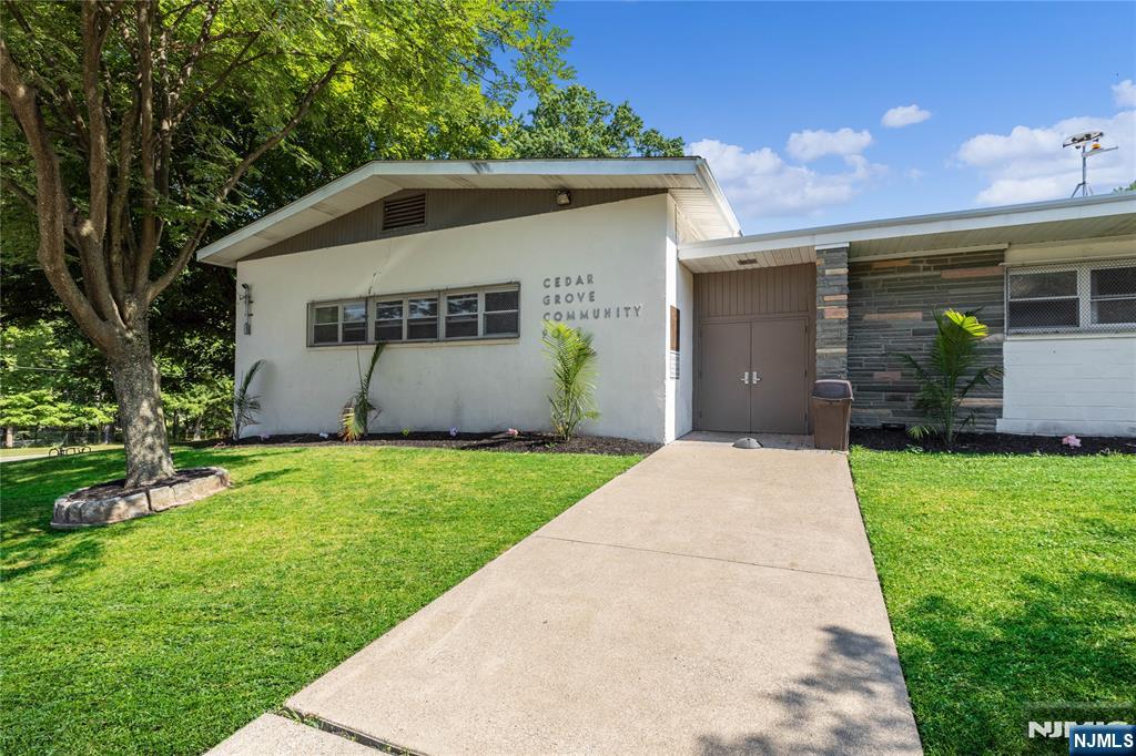 265 Little Falls Road Cedar Grove, NJ 07009 - Photo 45 of 49 a front view of house with yard and green space