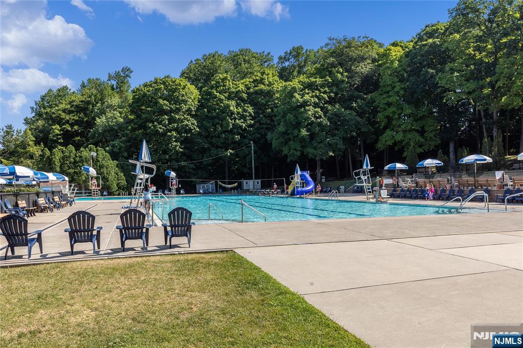 265 Little Falls Road Cedar Grove, NJ 07009 - Photo 49 of 49 a view of a swimming pool with sitting area