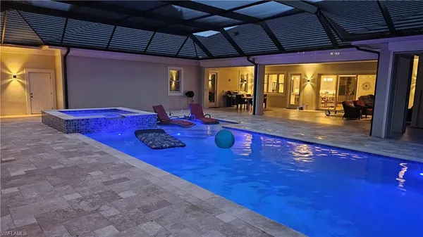 a indoor swimming pool with an outdoor seating