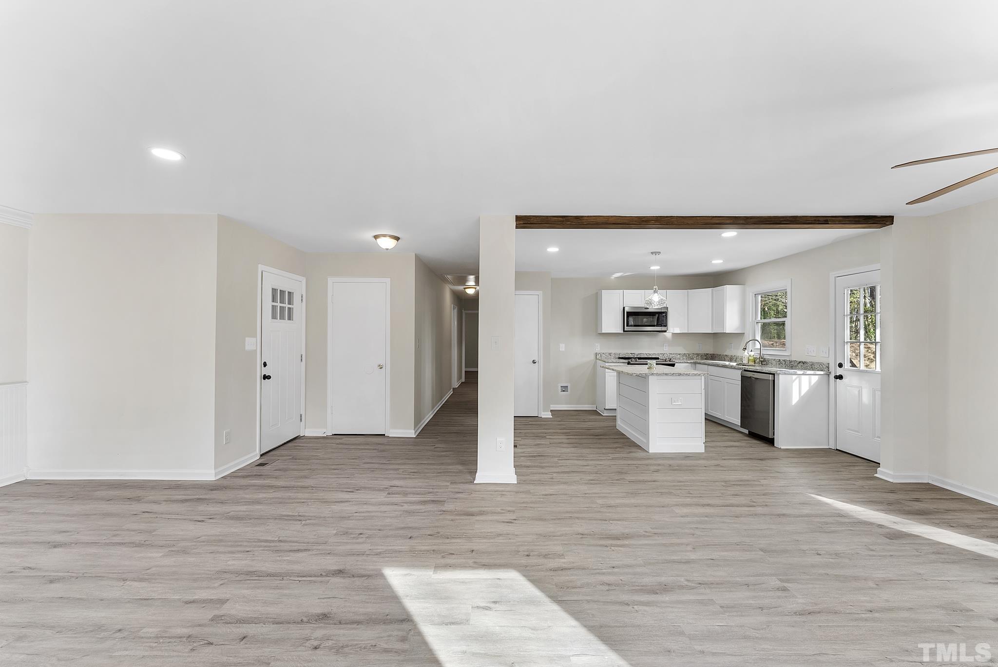 2125 Strebor Street Durham, NC 27705 - Photo 15 of 38 a view of kitchen with wooden floor