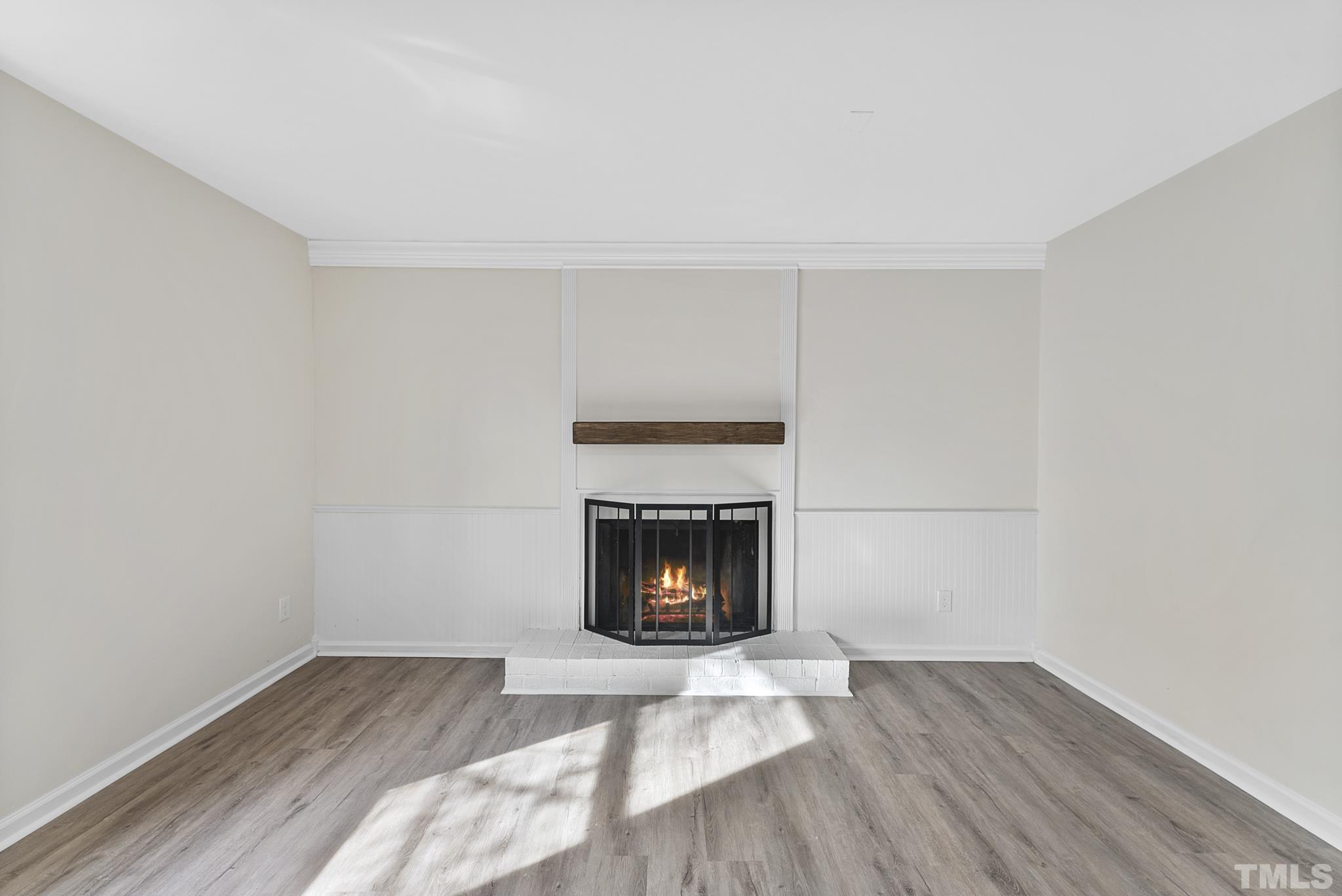 2125 Strebor Street Durham, NC 27705 - Photo 16 of 38 a room with a fireplace