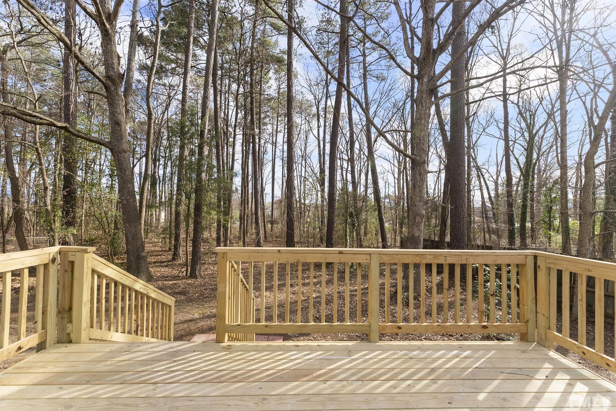 2125 Strebor Street Durham, NC 27705 - Photo 31 of 38 a view of a house with a wooden fence