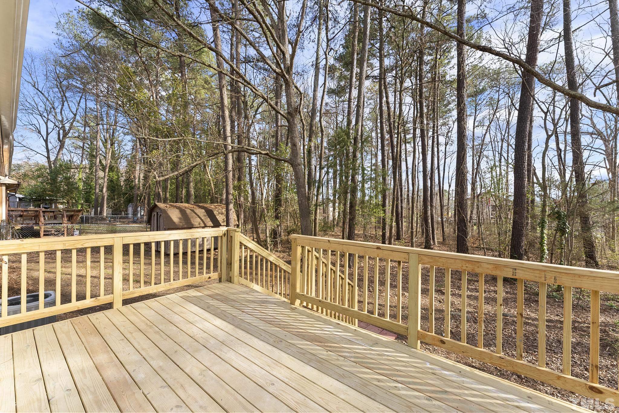 2125 Strebor Street Durham, NC 27705 - Photo 32 of 38 a view of a wooden roof deck