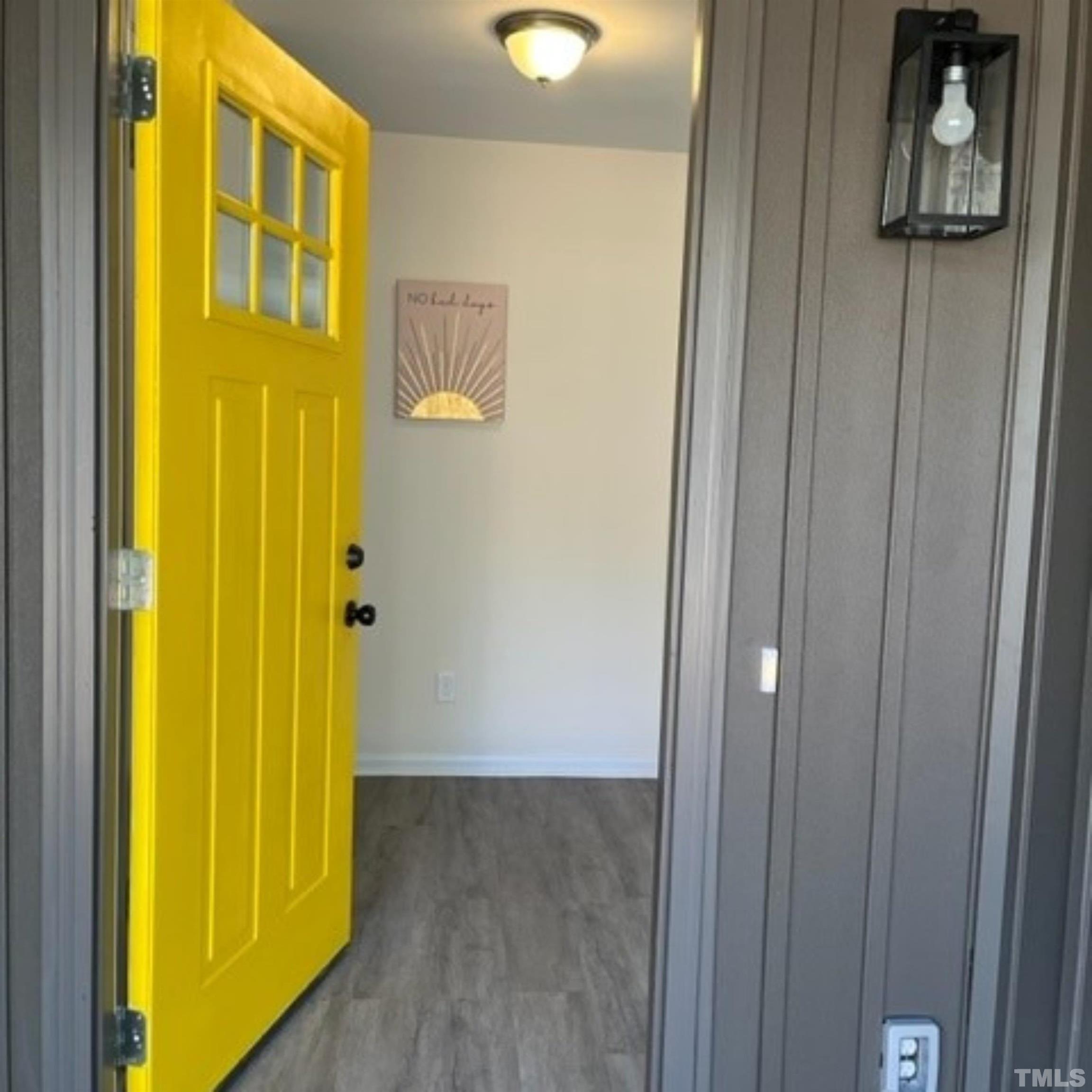 2125 Strebor Street Durham, NC 27705 - Photo 37 of 38 a view of an entryway with wooden floor