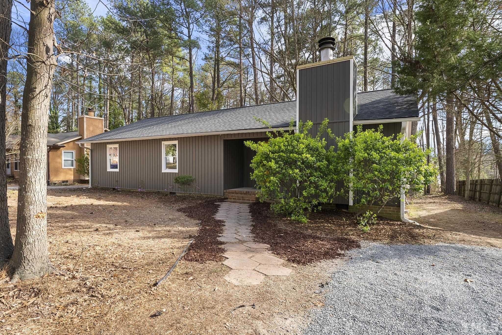 2125 Strebor Street Durham, NC 27705 - Photo 4 of 38 a view of a house with a yard and large tree