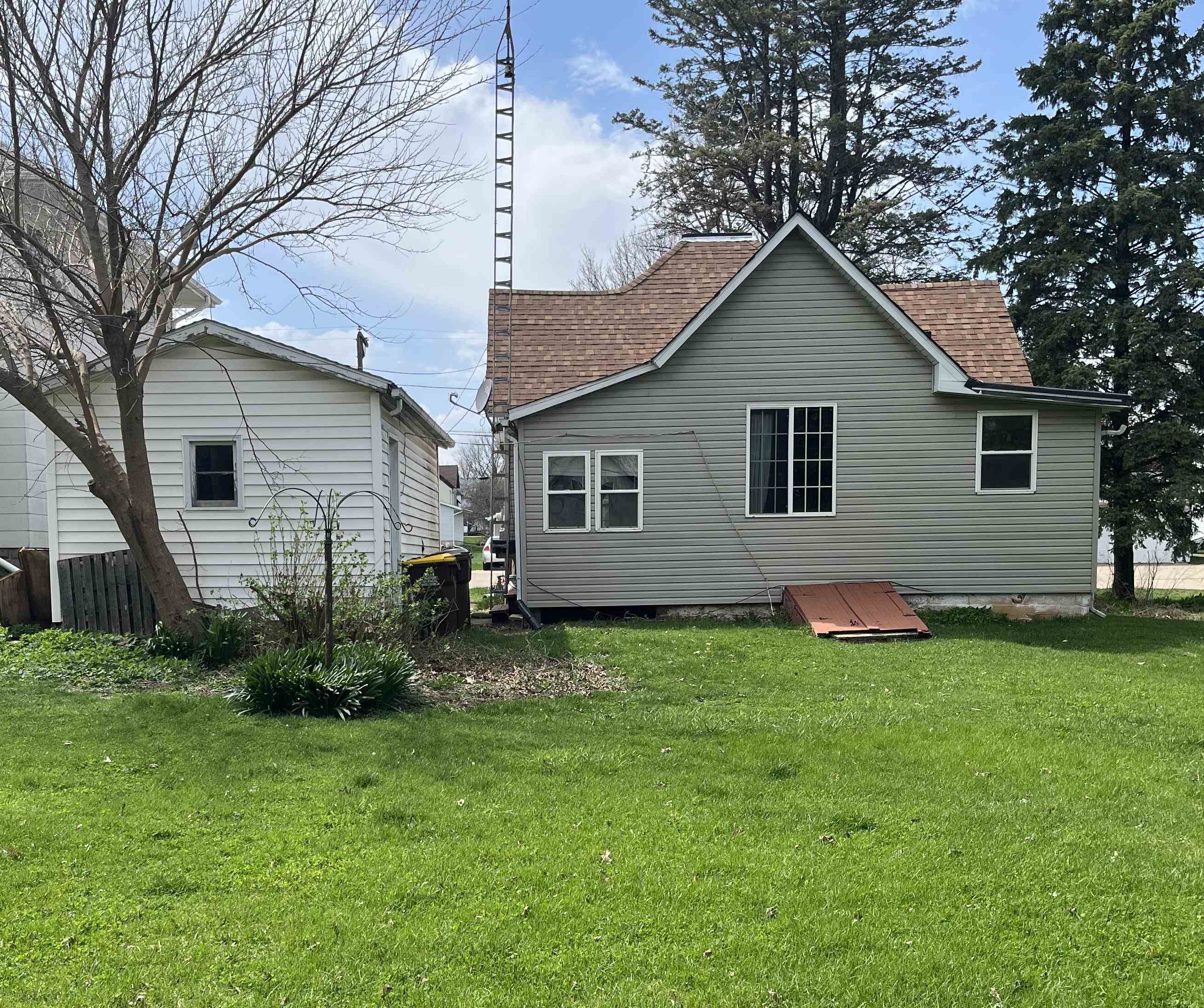 235 North Stockton Street Stockton, IL 61085 - Photo 3 of 18 a view of a house with a yard