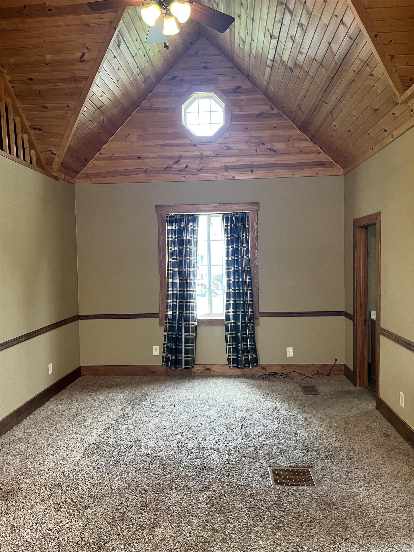 235 North Stockton Street Stockton, IL 61085 - Photo 5 of 18 a view of an empty room with a fireplace