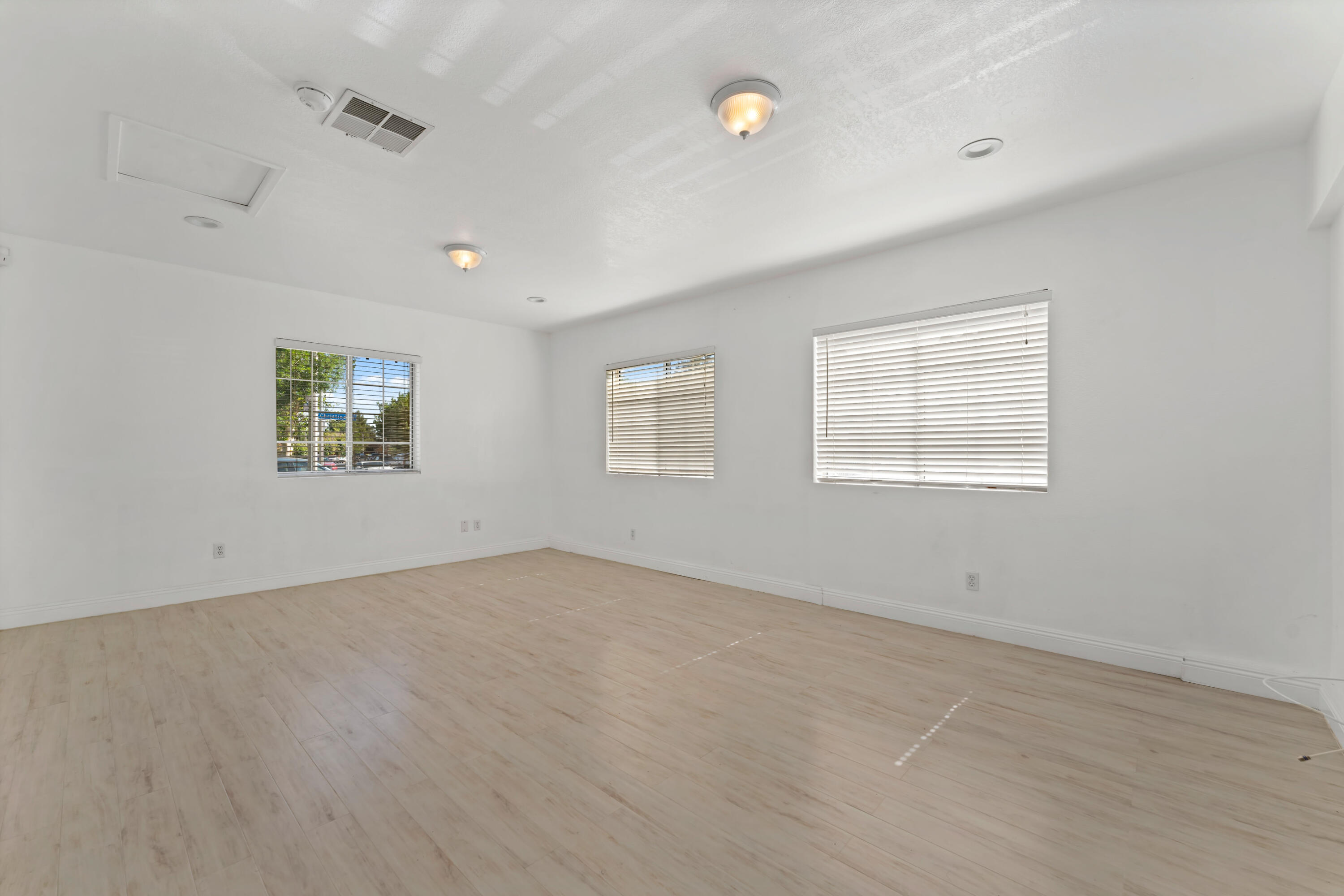 43333 Vineyard Drive Lancaster, CA 93535 - Photo 12 of 31 an empty room with windows