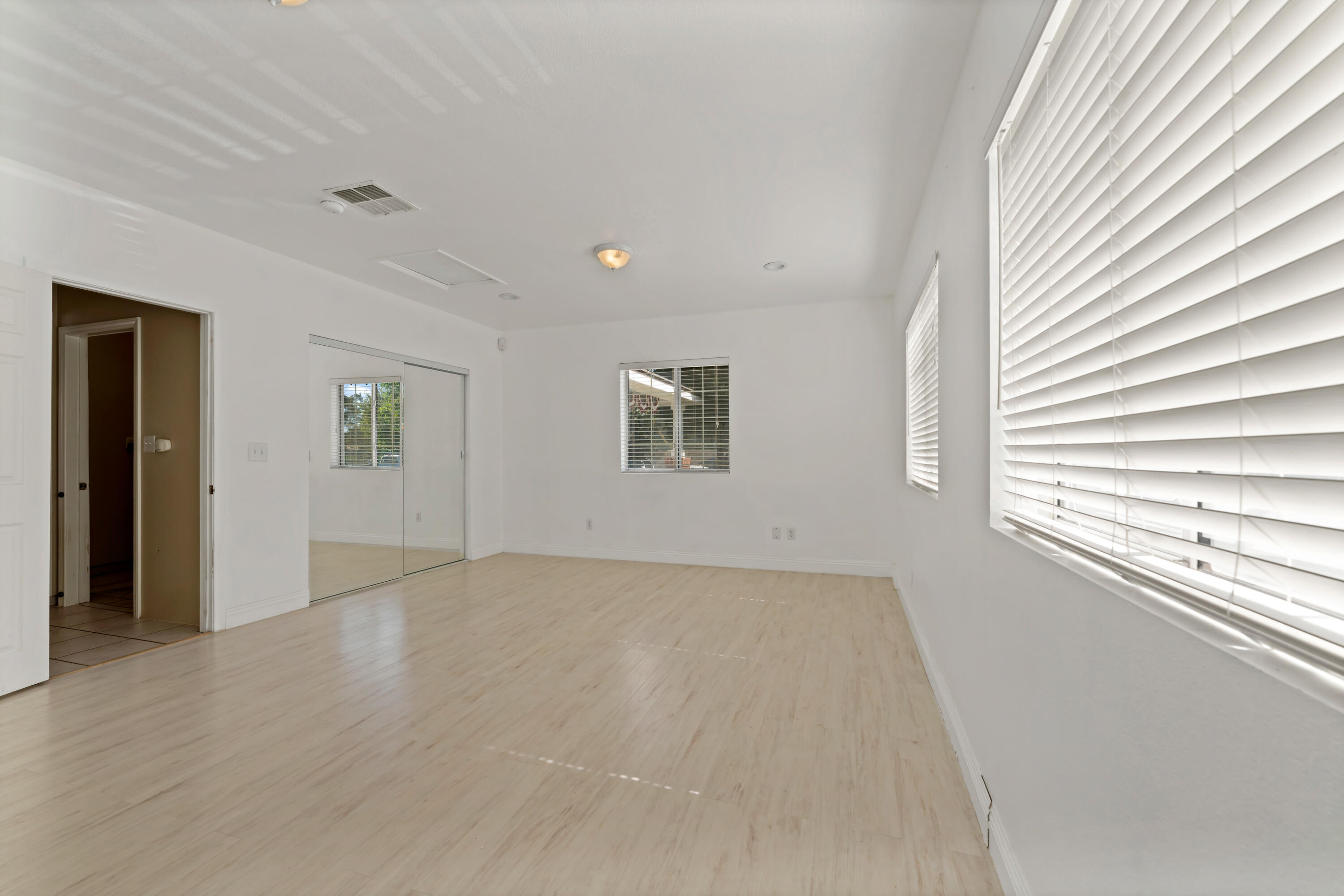 43333 Vineyard Drive Lancaster, CA 93535 - Photo 13 of 31 an empty room with windows