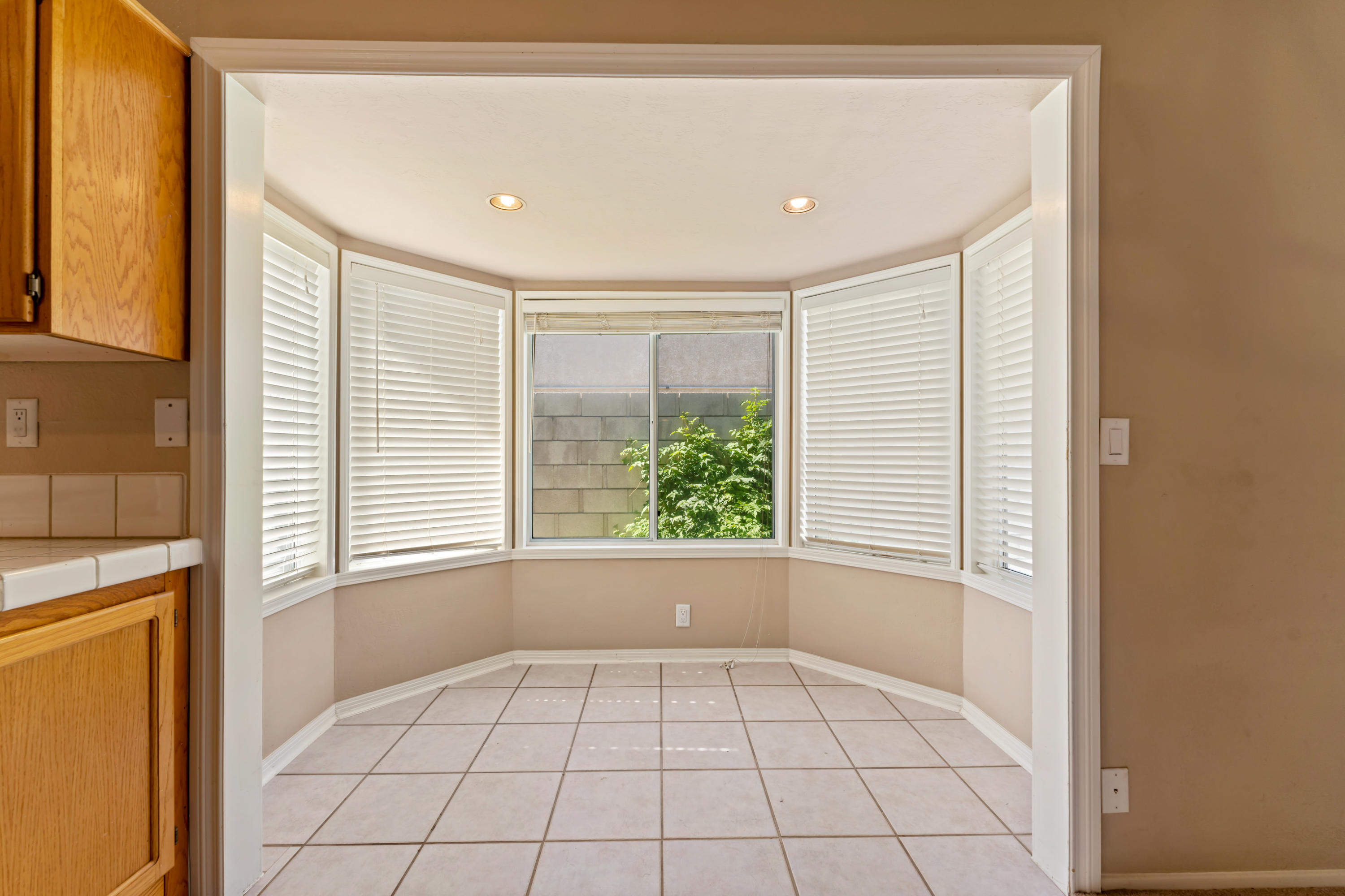 43333 Vineyard Drive Lancaster, CA 93535 - Photo 14 of 31 a view of an empty room with a window