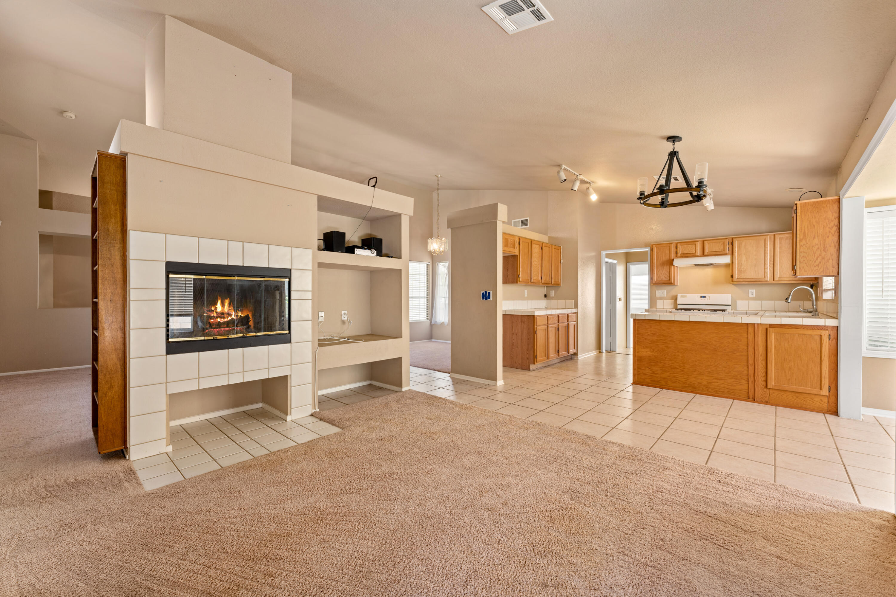 43333 Vineyard Drive Lancaster, CA 93535 - Photo 16 of 31 a view of a kitchen and an empty room