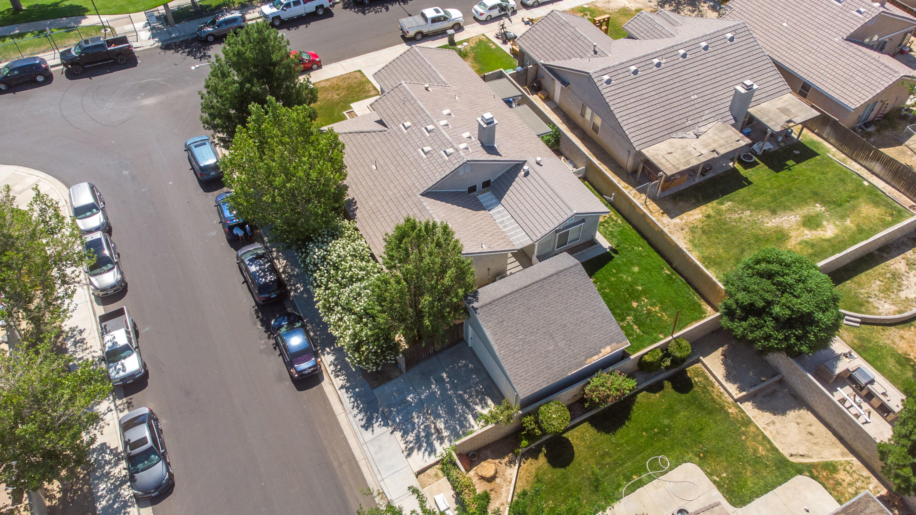 43333 Vineyard Drive Lancaster, CA 93535 - Photo 31 of 31 an aerial view of a house with a yard and pool