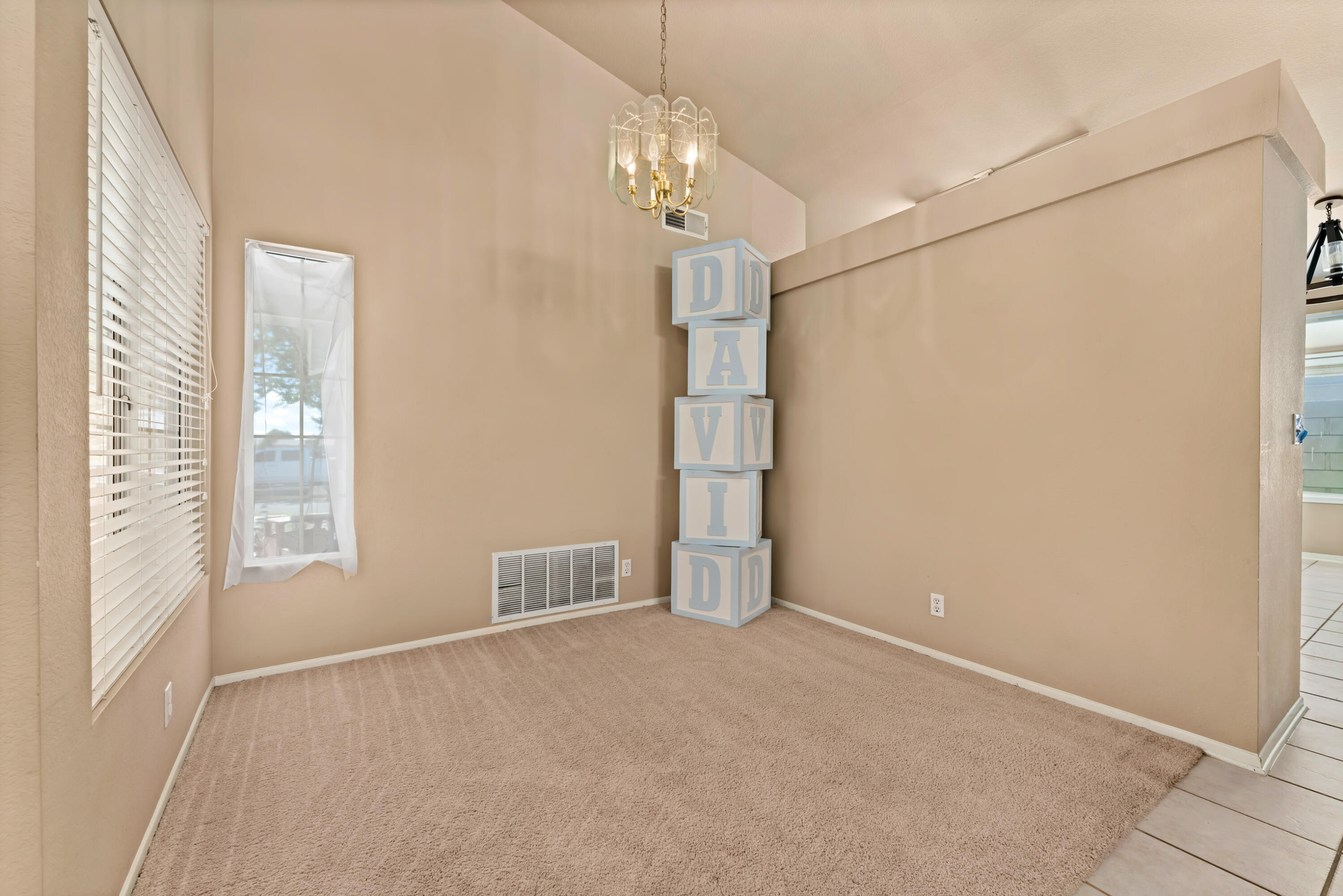 43333 Vineyard Drive Lancaster, CA 93535 - Photo 6 of 31 a view of an empty room with a window