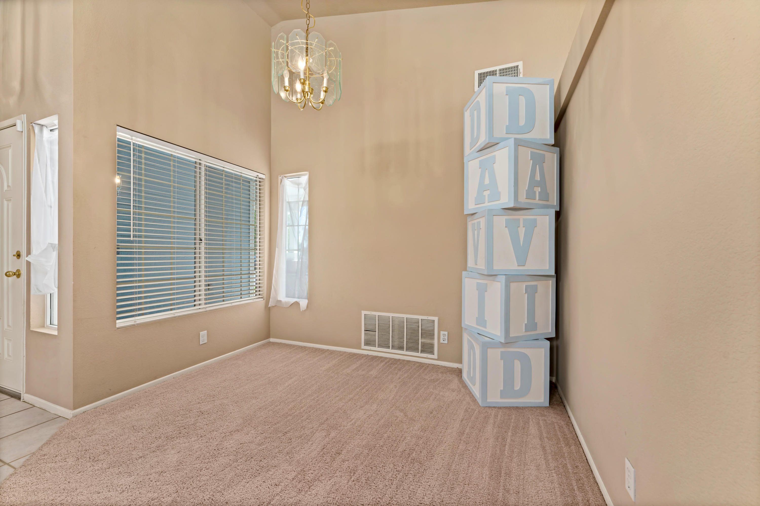 43333 Vineyard Drive Lancaster, CA 93535 - Photo 7 of 31 a view of empty room with windows