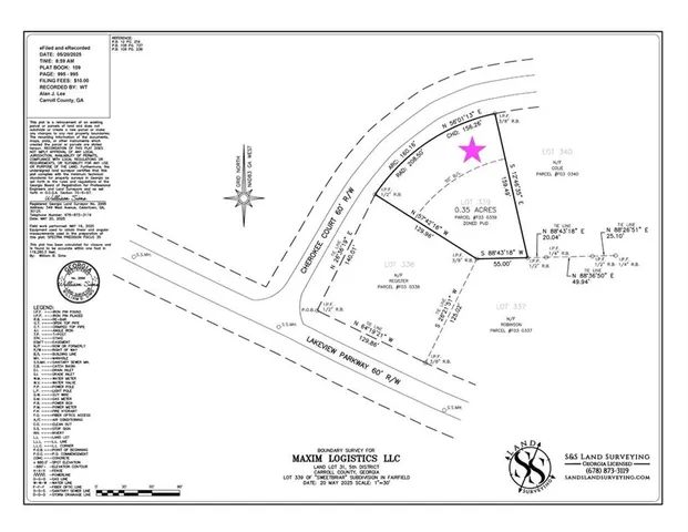 a front view of a house with a garden and trees