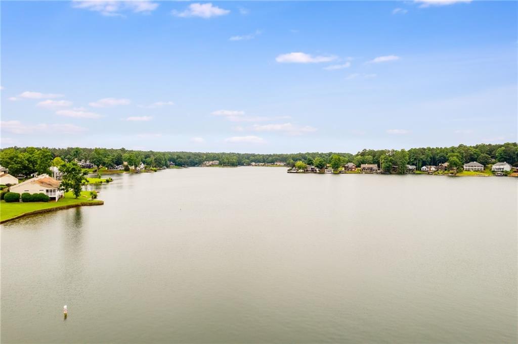 3339 Cherokee Court Villa Rica, GA 30180 - Photo 15 of 24 a view of a lake with outdoor space