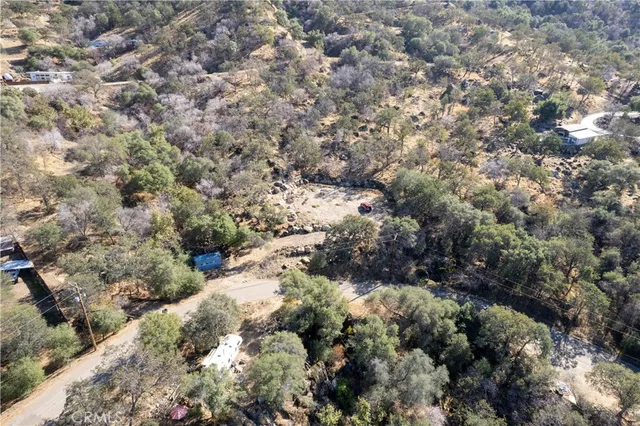 a view of a dry yard covered with snow