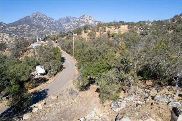 a view of a house with a street