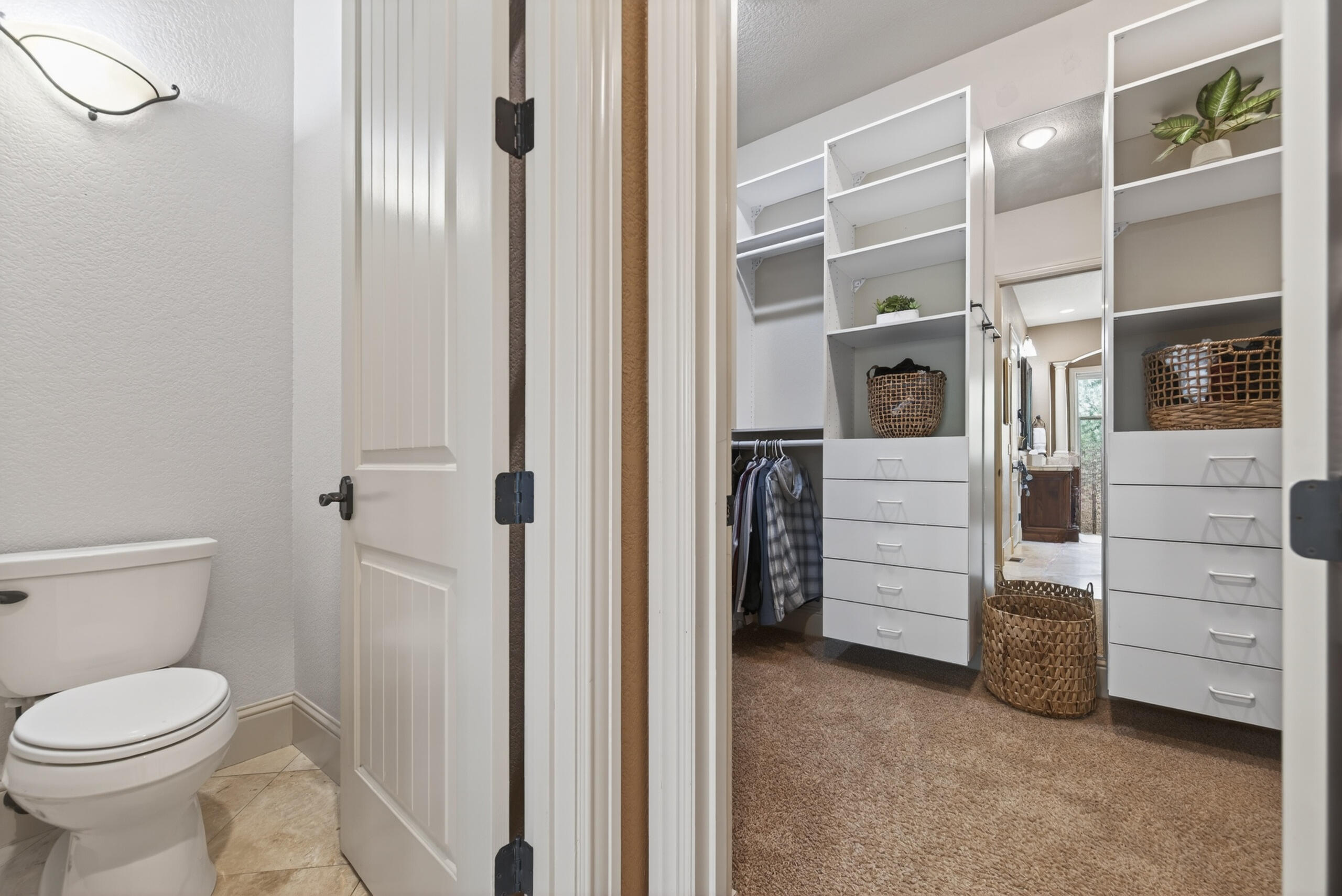 9009 Merlin Drive Redmond, OR 97756 - Photo 36 of 98 a bathroom with a toilet and a shower