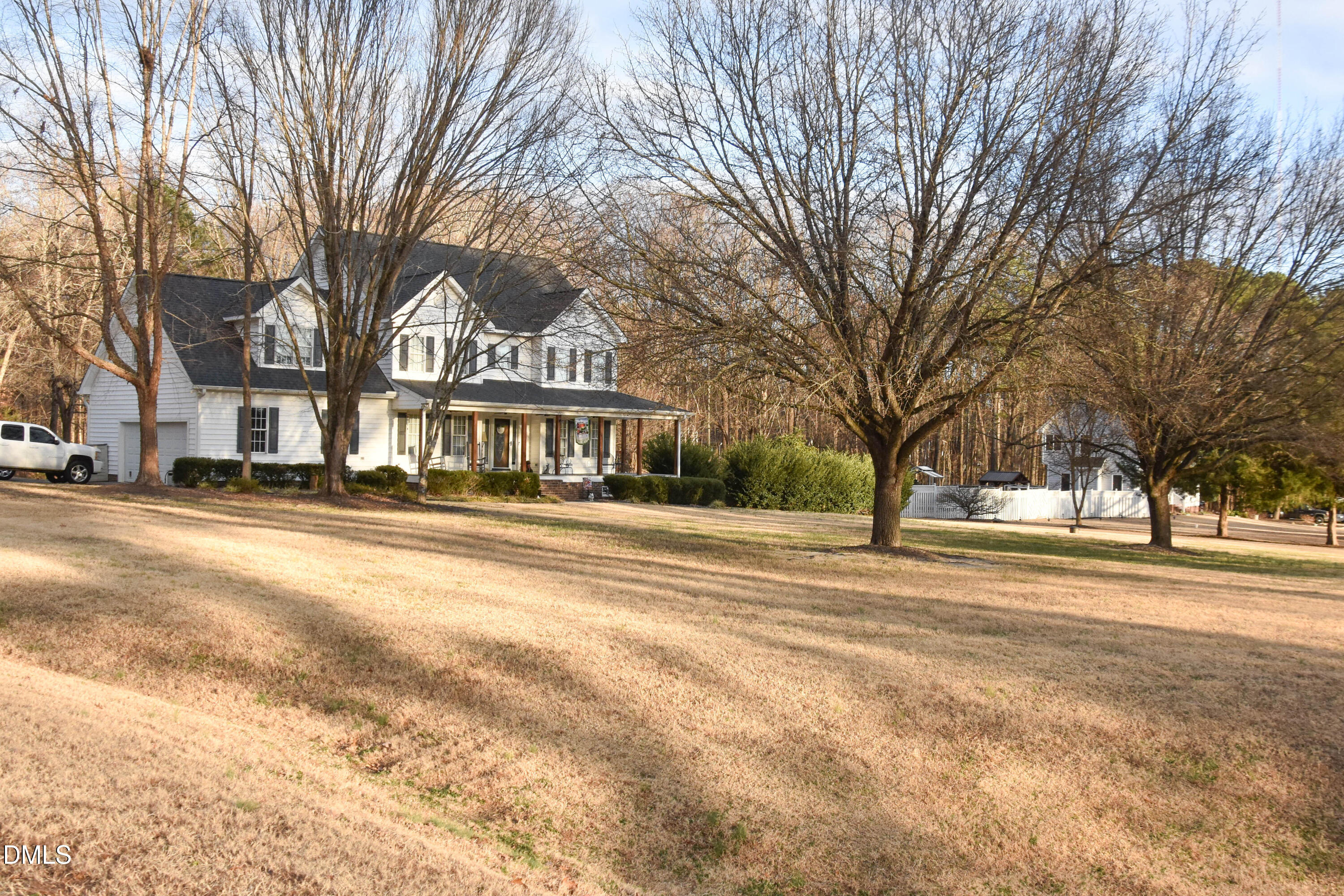 5908 Deep Spring Circle Wake Forest, NC 27587 - Photo 5 of 51 a front view of residential houses with yard and trees