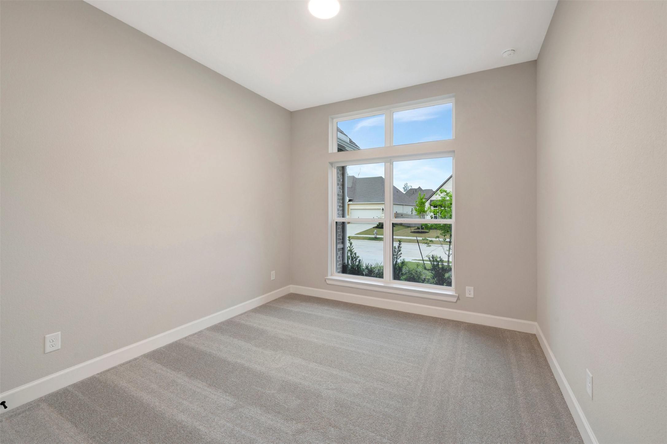 15722 Terracotta Terrace Conroe, TX 77302 - Photo 15 of 50 an empty room with a window