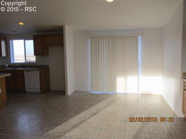 21376 County Road South, Unit 2 Rush, CO 80833 - Photo 7 of 17 A bright dining room off the kitchen