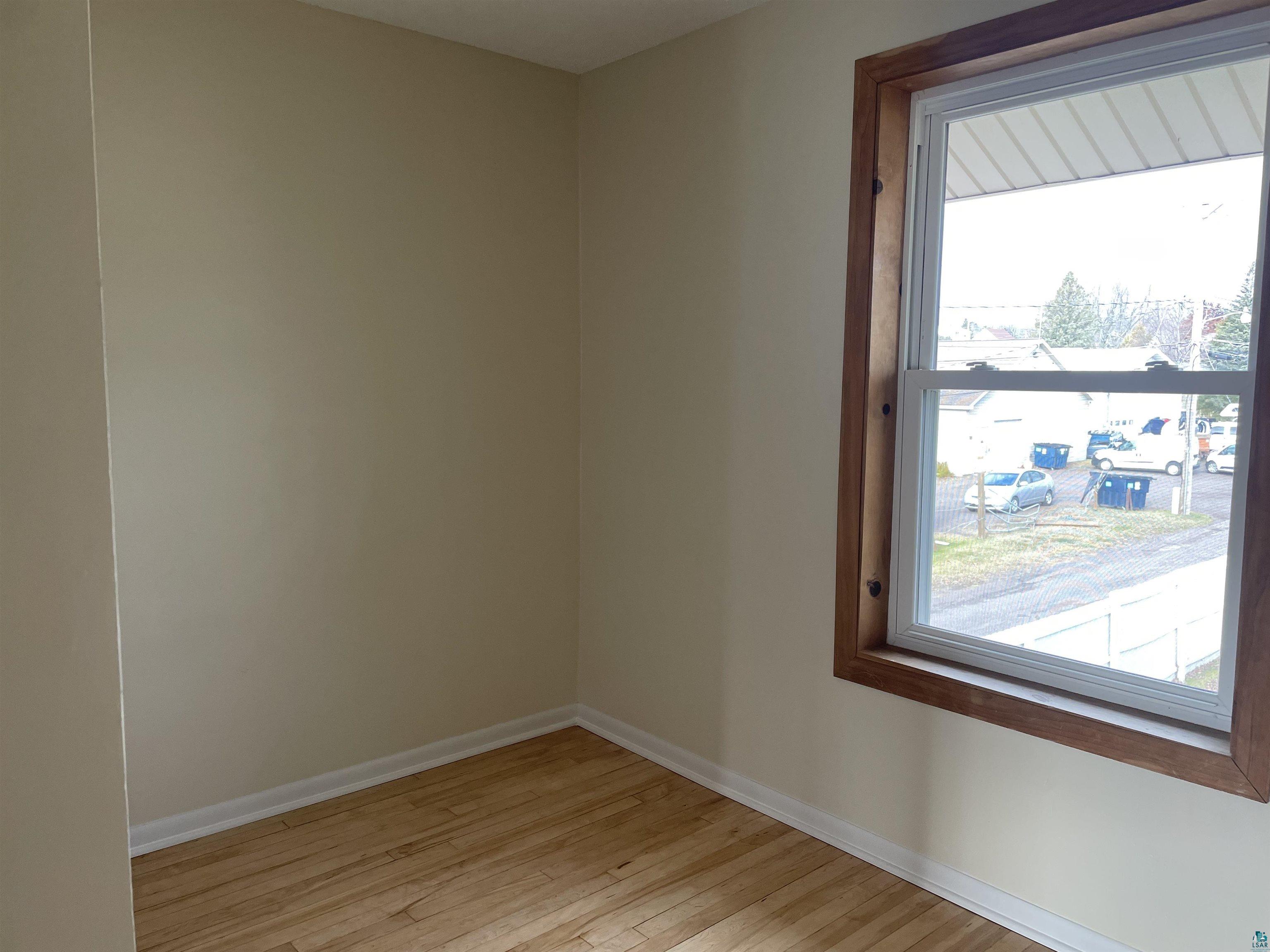 219 4th Street Proctor, MN 55810 - Photo 17 of 25 Spare room featuring light hardwood / wood-style floors