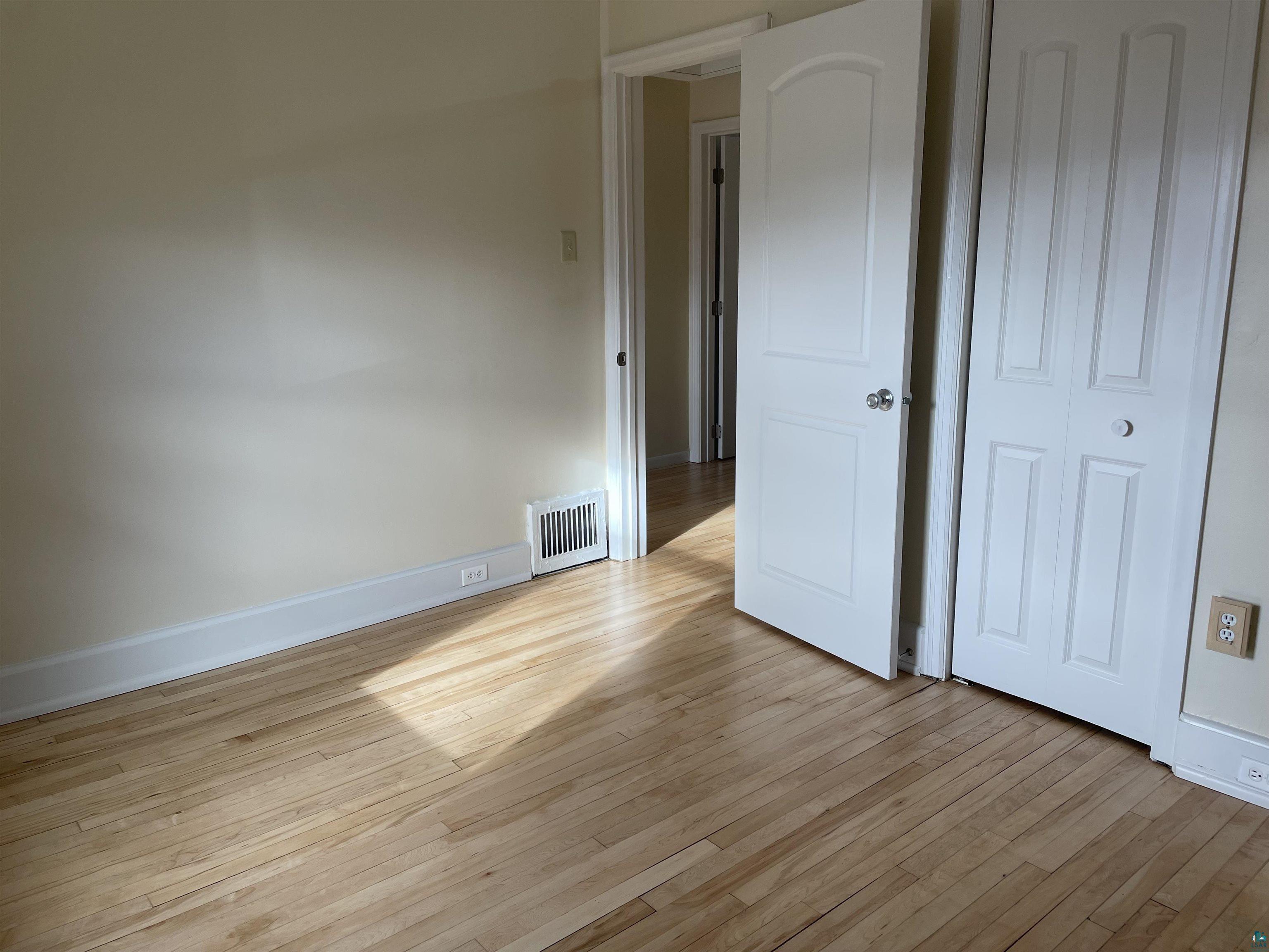 219 4th Street Proctor, MN 55810 - Photo 20 of 25 Unfurnished bedroom featuring light hardwood / wood-style flooring